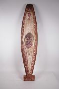 A painted wood carving, possibly from New Guinea, 36" high