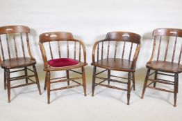 A near pair of C19th elm spindle back smoker's armchairs, and a similar pair of dining chairs,