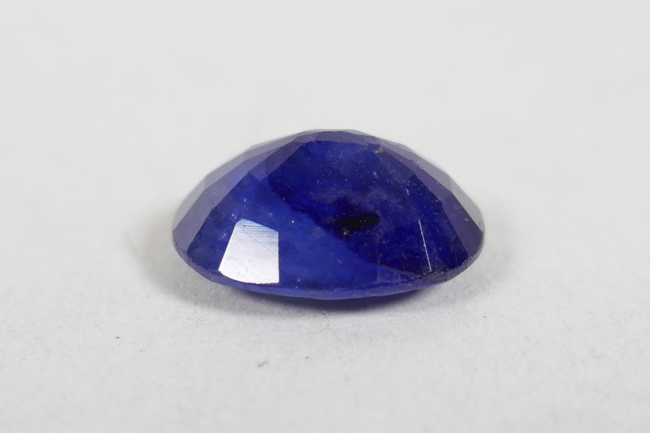 An 8.10ct blue sapphire, oval mixed cut, IDT certified, with ceritificate - Image 3 of 5