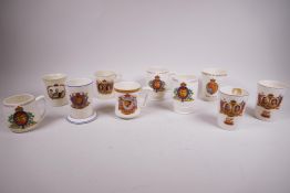 A collection of unusual commemorative porcelain beakers and mugs issued for the 1937 coronation