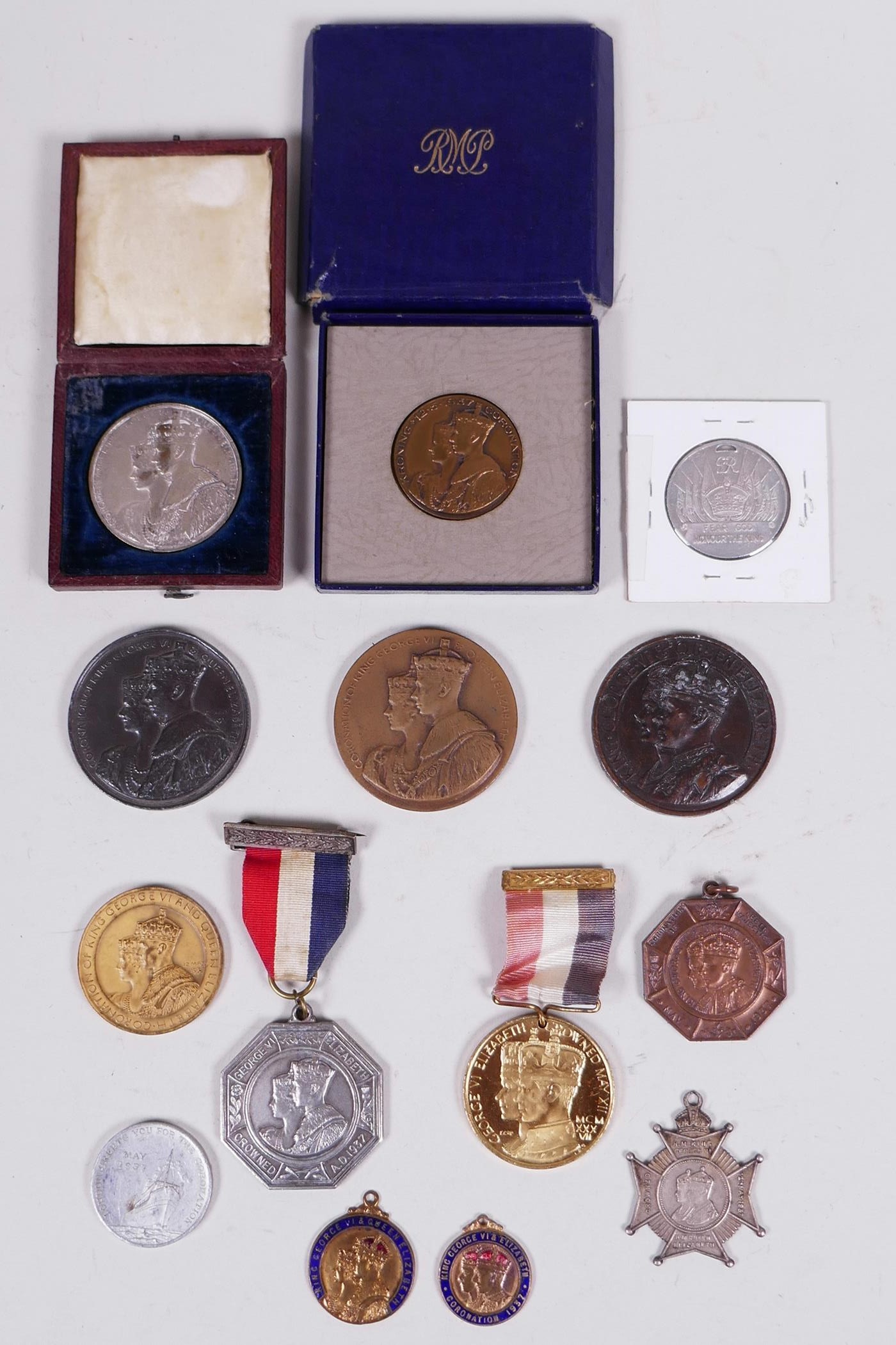 Six medals plus eight 1937 commemorative coronation medallions, including a silver medallion