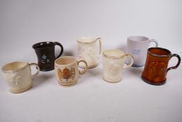 A collection of seven unusual 1937 coronation commemorative pottery tankards; three by Crown Devon