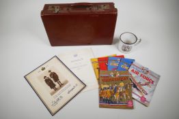 A children's 1937 coronation small brown suitcase, embossed with portraits of George VI and Queen