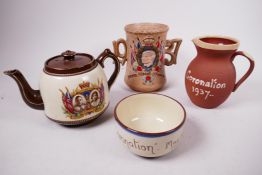 In the style of Doulton a 1937 commemorative coronation loving cup in unglazed terracotta