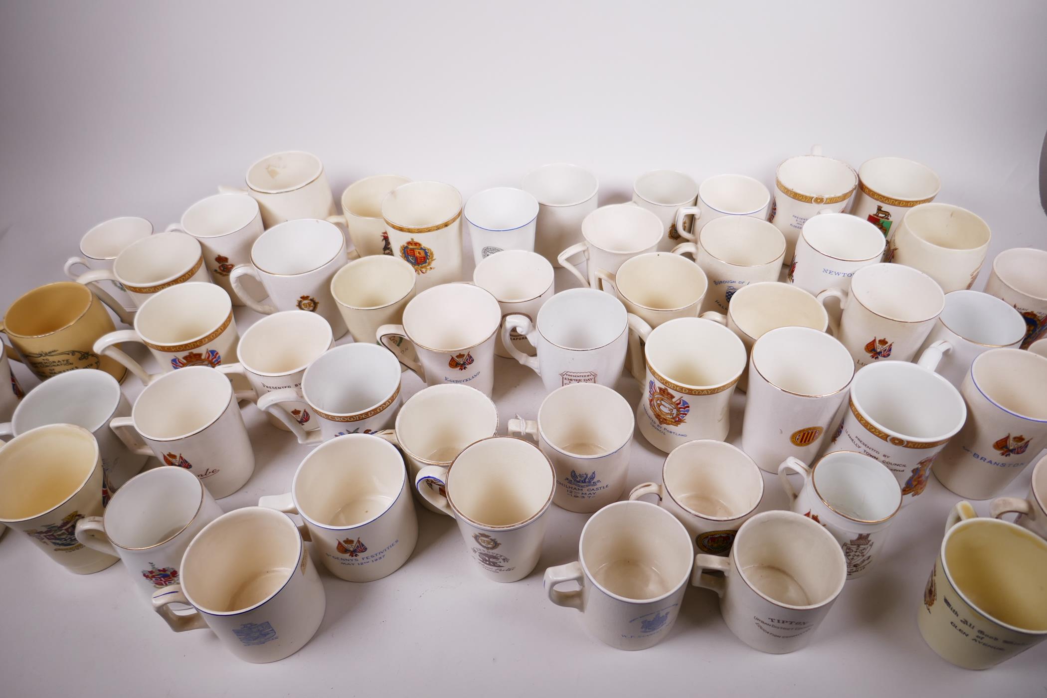 A large quantity of regional 1937 coronation commemorative porcelain and pottery mugs, beakers etc
