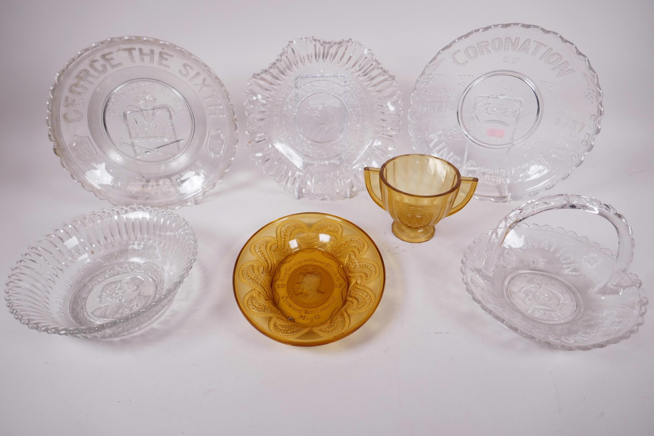 A collection of seven 1937 commemorative coronation pressed glass vessels in both clear and amber