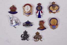 A collection of ten souvenir 1937 coronation enamelled metal badges and brooches