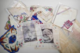 A variety of textiles, including commemorative 1937 coronation handkerchiefs, pillowcases and towel