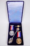 A commemorative original boxed set of two 1937 coronation medals, bright silver and gold metal