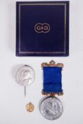 A 9ct small gold medal for the 1902 coronation of Edward VII and Queen Alexandra