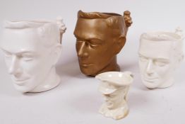 Four commemorative portrait Toby Jugs featuring the head of George VI