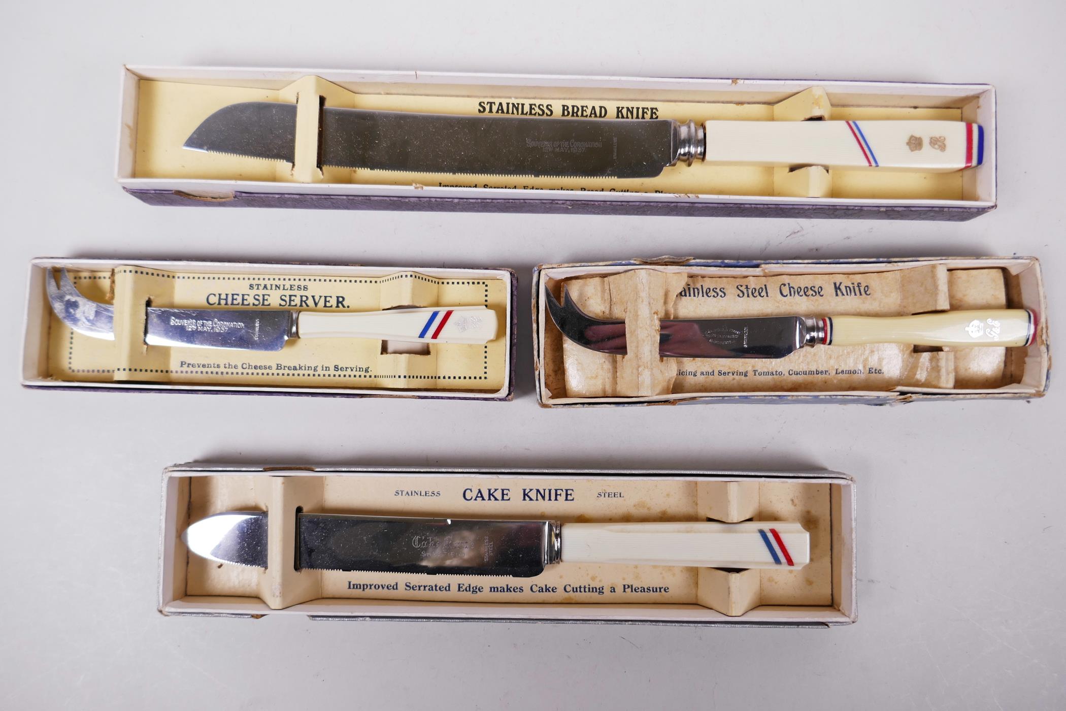 Four 1937 coronation Bakelite & stainless steel knives in their original presentation boxes