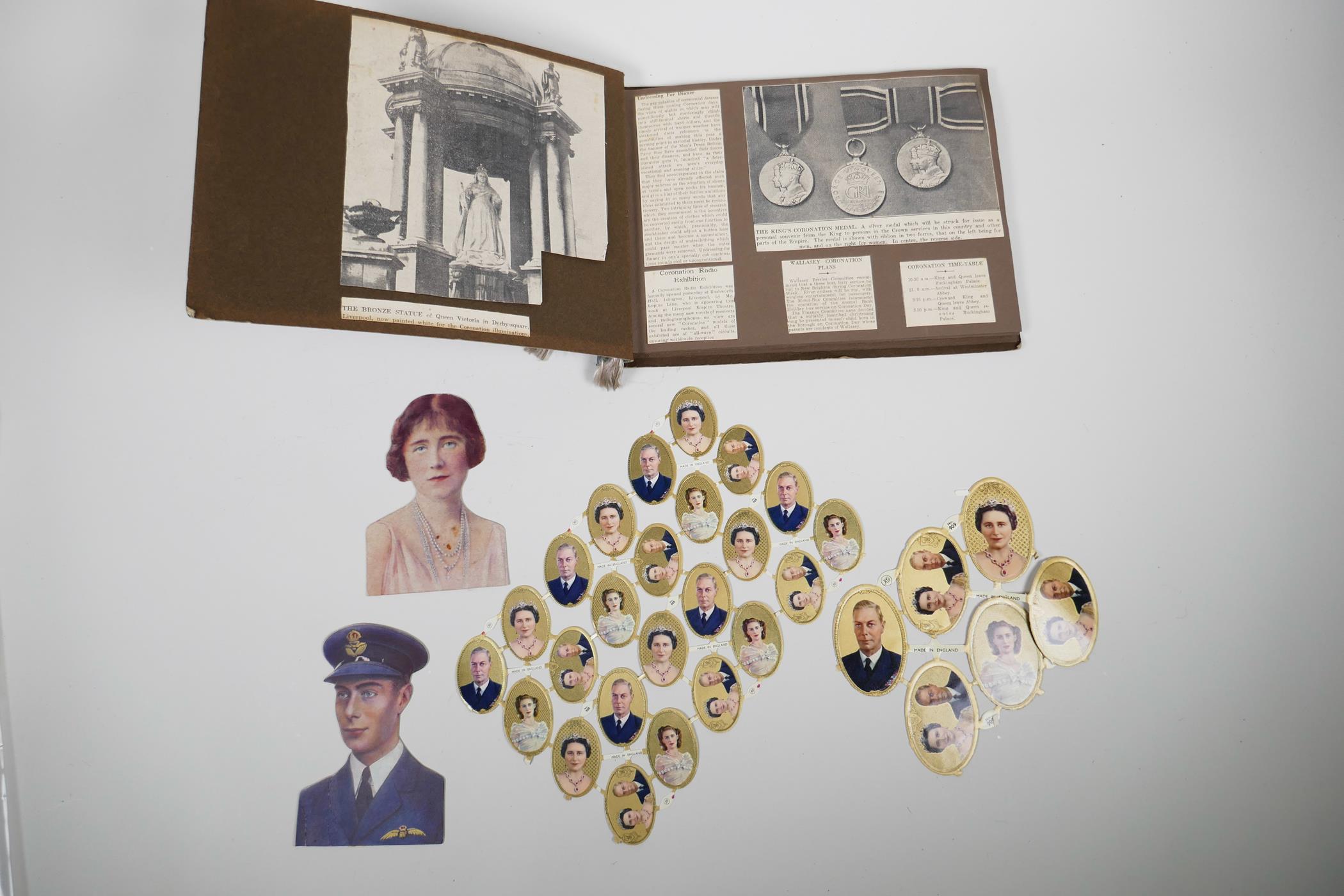 A well-presented scrapbook filled with original newspaper cuttings detailing coronation events