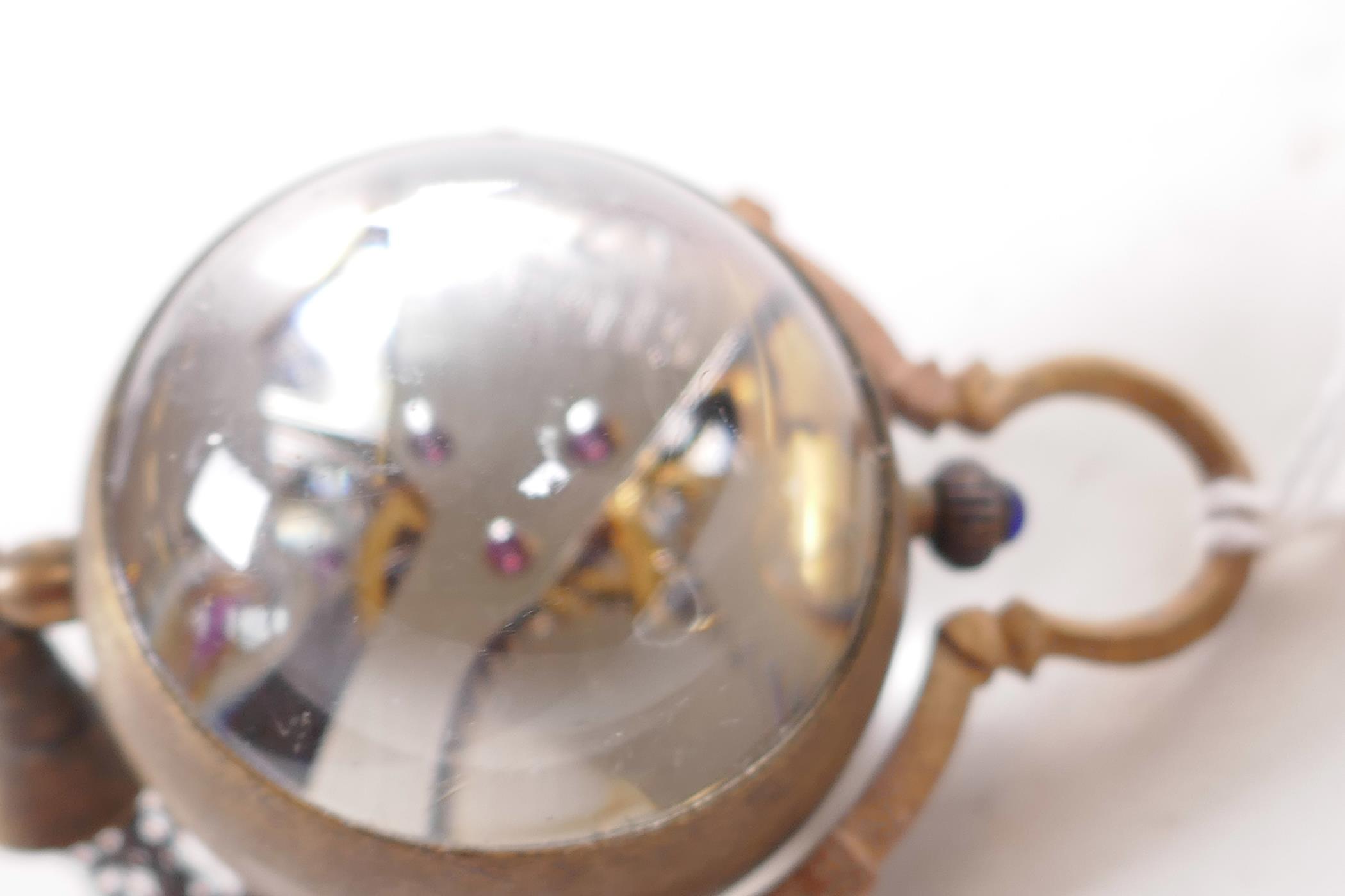 A small glass and brass pendant ball watch, 1¼" diameter - Image 3 of 3