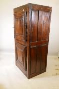 A French oak cupboard with two doors and panelled sides, late C17th/early C18th, 31" x 23" x 66"