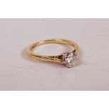 A 9ct yellow gold and platinum solitaire diamond ring, 0.5ct, 2.8g, size 'N'