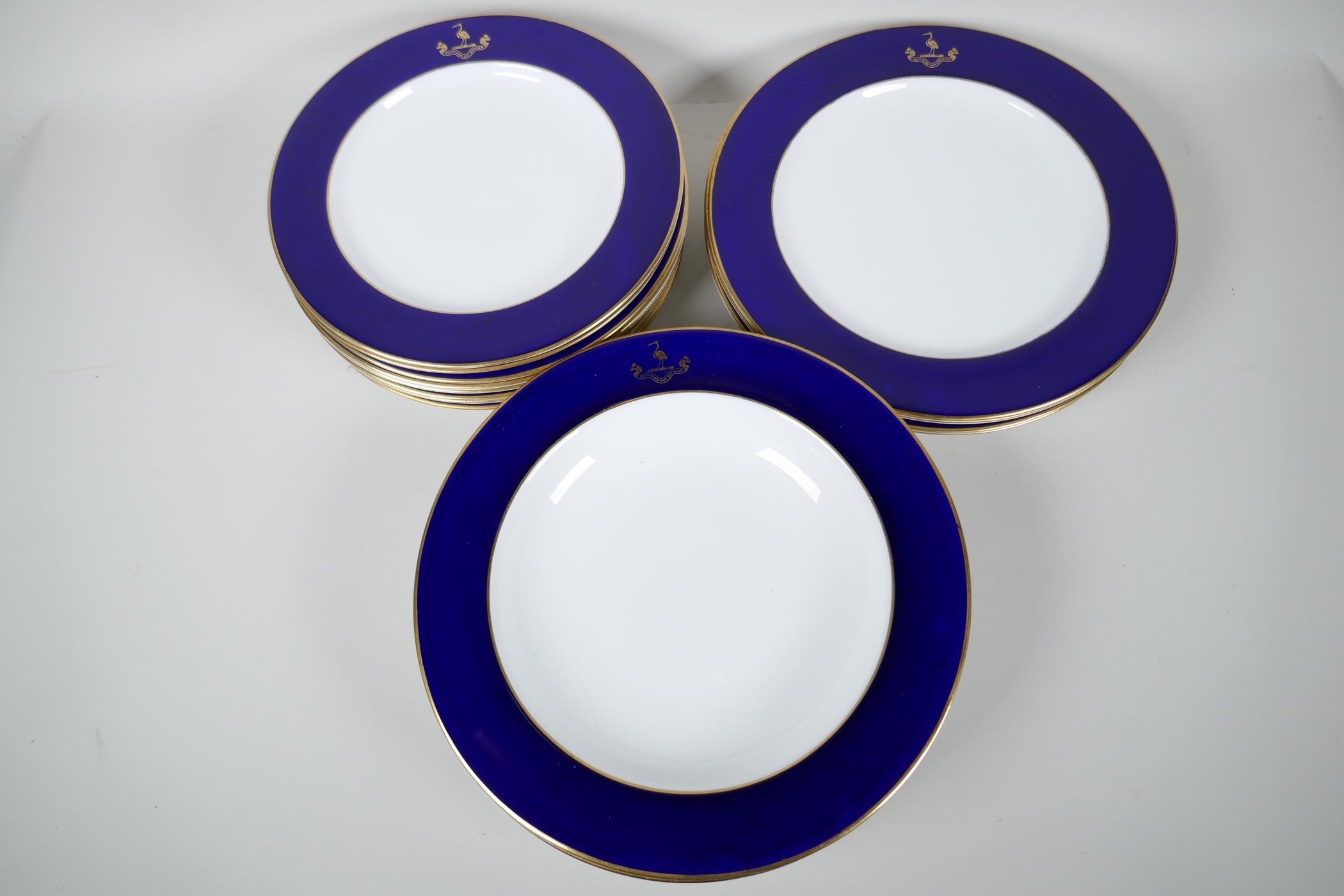 Vintage Royal Worcester cobalt blue and gilt decorated tableware, embellished with a heron crest and