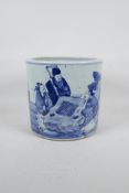 A Chinese blue and white porcelain brush pot decorated with figures in a landscape playing Go, 8"