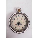 A replica top wind pocket watch set with a ring of pearl beads front and back, the back decorated