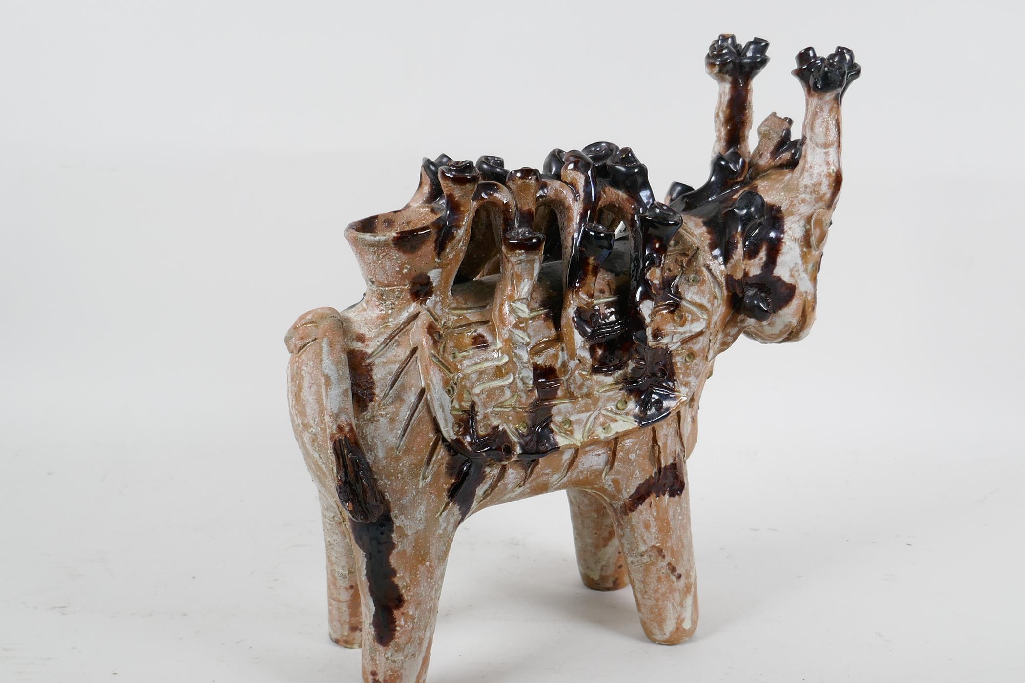 An unusual studio pottery figure of an Indian cow with elaborate saddle, part treacle glazed, 10" - Image 2 of 4