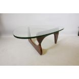An Isamu Noguchi style pebble shaped coffee table with glass top, 50" x 37½", 16" high