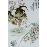 A Chinese polychrome porcelain panel decorated with a rooster and flowers in a hardwood frame, 13" x