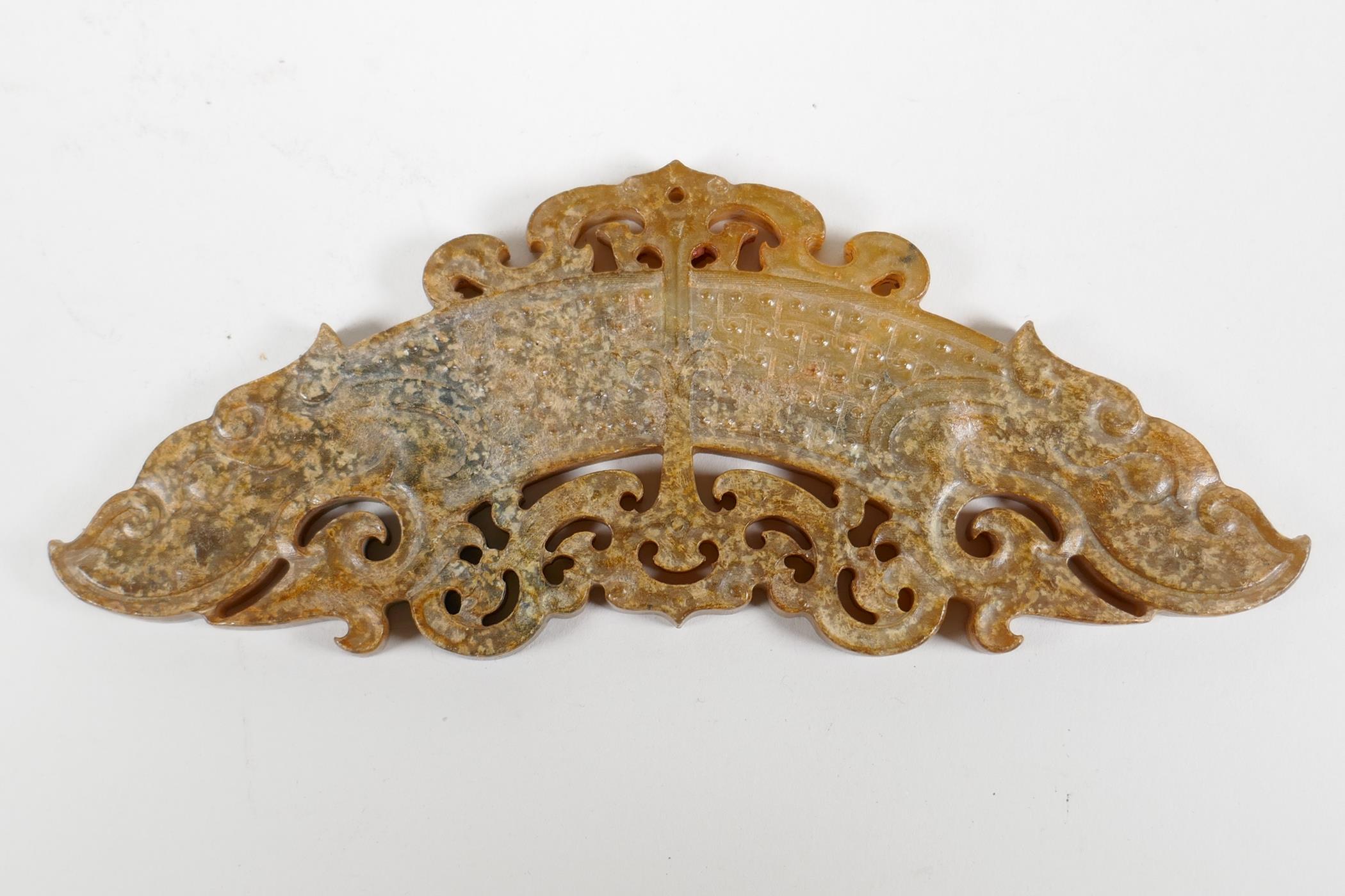 A Chinese carved and pierced hardstone ornament/pendant with stylised dragon decoration, 5½" long - Image 2 of 2