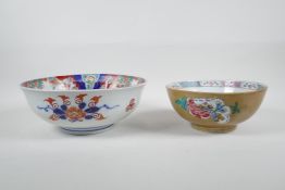 A Chinese Imari porcelain bowl, and a famille rose porcelain bowl (A/F pinned), largest 10" diameter