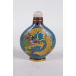 A Chinese cloisonne snuff bottle decorated with a dragon and phoenix in flight, 4 character mark