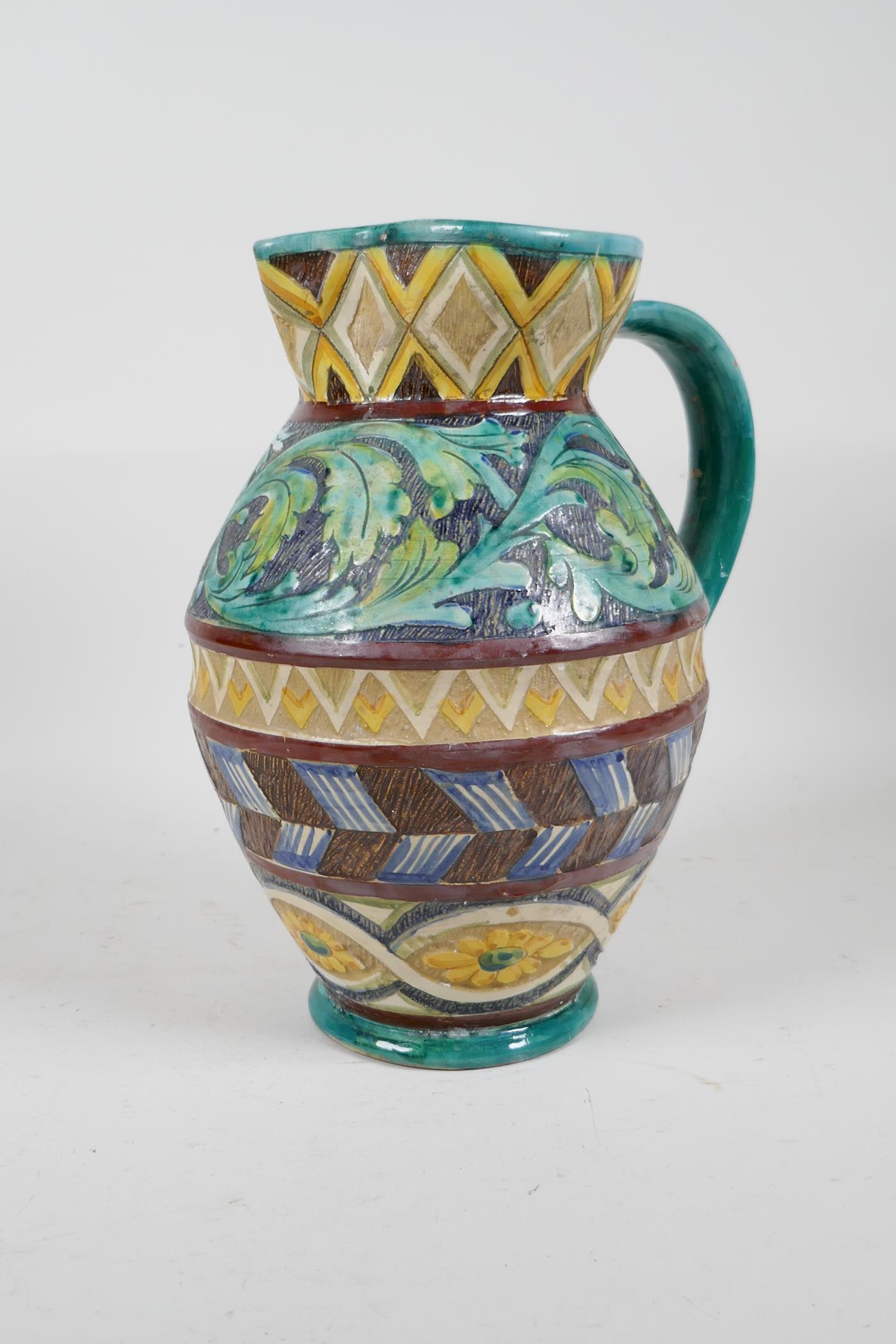 A majolica water jug with scrolling leaf and sunflower decoration, 10" high - Image 3 of 5