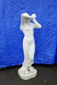 A painted concrete garden statue of Venus, 45" high