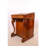 A Victorian burr walnut davenport, the slope with pierced gallery pull out top and inset with