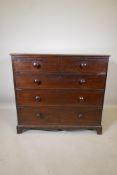 An early C19th mahogany chest of two short over three graduated long drawers, the drawers with