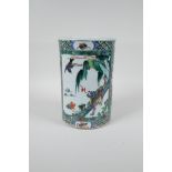 A Chinese famille verte porcelain brush pot decorated with landscape scenes with kylin and birds,