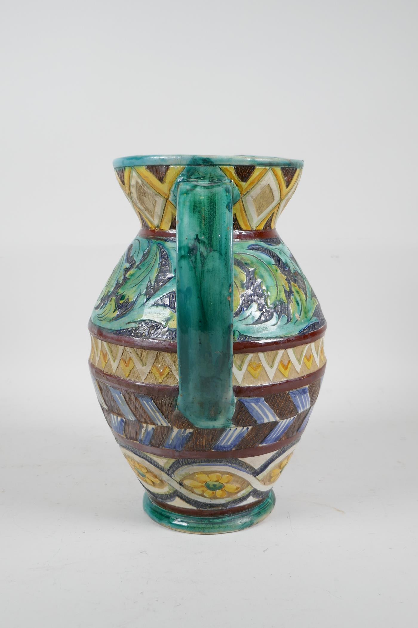 A majolica water jug with scrolling leaf and sunflower decoration, 10" high - Image 4 of 5