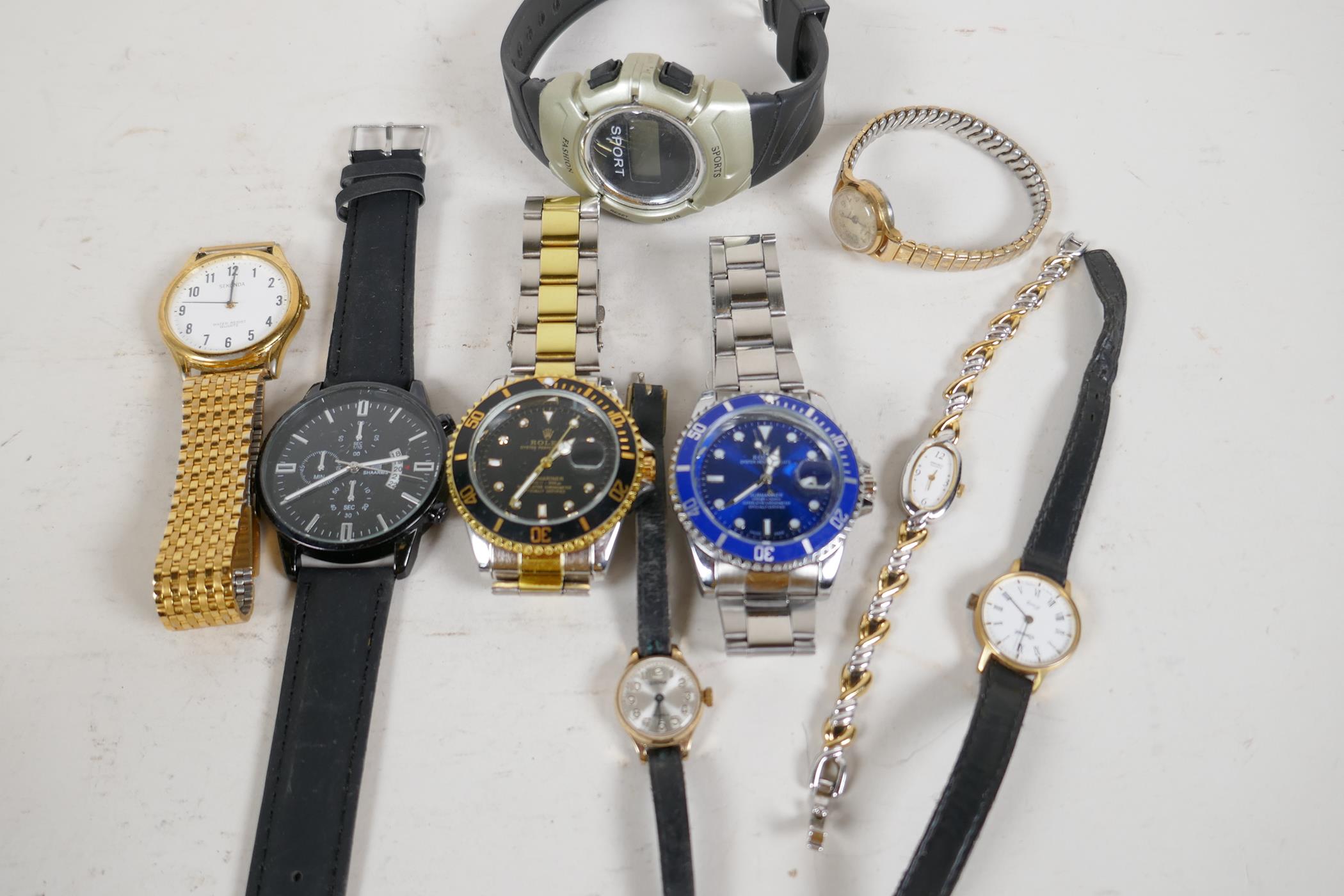 A collection of various watches, not in working order