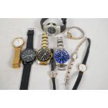 A collection of various watches, not in working order