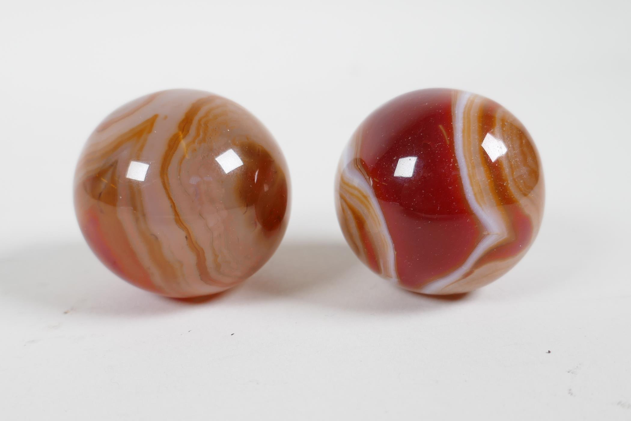 A pair of agate meditation balls, 1½"