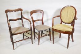 An early C19th spoon back open armchair, together with a C19th elm open armchair with ring turned