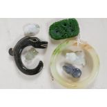 A collection of jade and hardstone ornaments including pendants, bangles etc