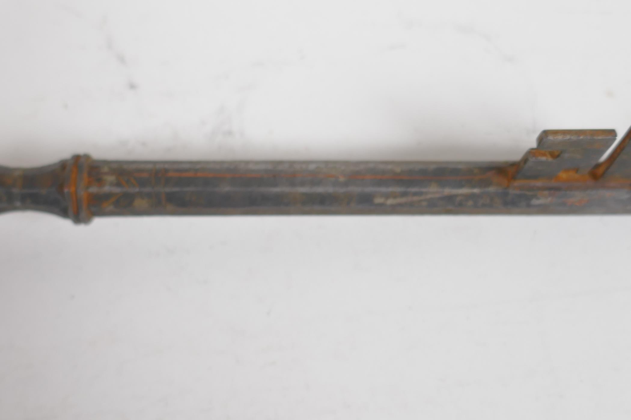 An antique Persian metal key made from a gun barrel, 9" long - Image 4 of 4
