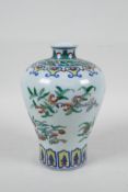 A Chinese doucai porcelain meiping vase decorated with branches bearing fruit, 6 character mark to