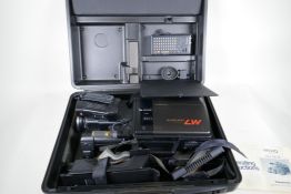 A Panasonic VHS movie camera and accessories in a fitted case