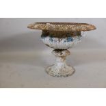 A Victorian cast iron campagna garden urn of flared, fluted, classical form, aged surface with