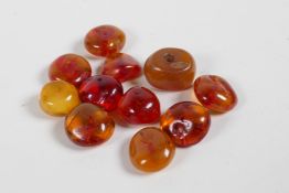 A collection of loose amber beads