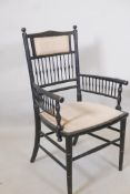 A C19th ebonised Aesthetic style bedroom chair in the style of William Morris