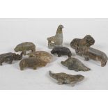 A collection of ten small African carved soapstone animal figures, largest 3" long