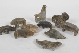 A collection of ten small African carved soapstone animal figures, largest 3" long