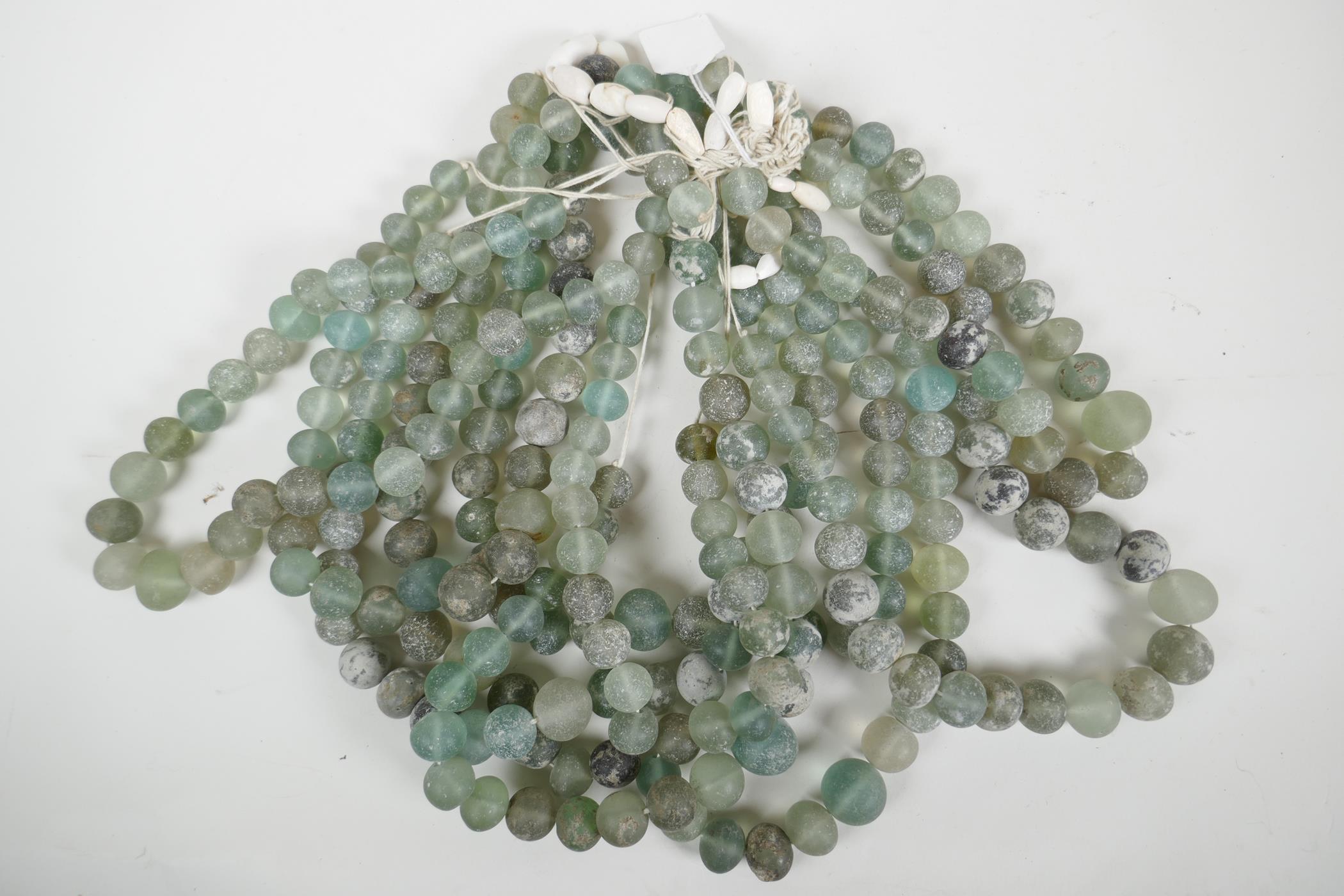 A quantity of string glass beads - Image 2 of 2