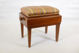 A mahogany piano stool, with wind up scissor action height adjustment, 17" x 22" X 23"